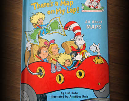 The book “There’s a Map on My Lap!” by Tish Rabe.